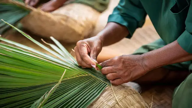 Artisan at Work with Palm Leaves